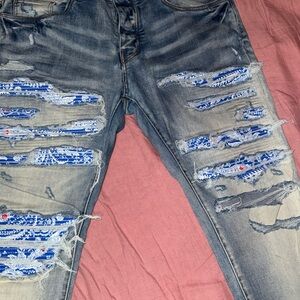 AMIRI Distressed Blue and Gray Skinny Jeans